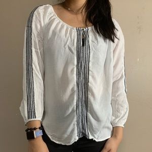 white shirt with cuffed sleeves